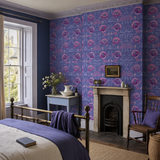 Purple floral wallpaper in a bedroom, Alice Periwinkle by Olenka, with joinery painted in Pale Periwinkle