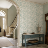 Teal geometric wallpaper in a hallway, Berry Dot - Duckegg by OHPOPSI, with joinery painted in Goose Green