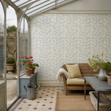 Teal geometric wallpaper in a garden room, Berry Dot - Surf by OHPOPSI, with joinery painted in Blue Steele