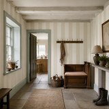 White striped wallpaper in a hallway, Bloc Stripe Chalk by OHPOPSI, with joinery painted in Groni