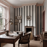 Blue striped wallpaper in an office, Bloc Stripe Midnight by OHPOPSI, with joinery painted in Don Burgundy