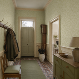 Green abstract wallpaper in a hallway, Elements Fennel by OHPOPSI, with joinery painted in Freaky Leaves