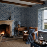 Blue abstract wallpaper in a snug, Elements Indigo by OHPOPSI, with joinery painted in Dart Frog