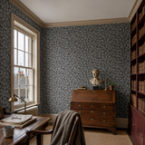 Blue abstract wallpaper in a study, Elements Midnight by OHPOPSI, with joinery painted in Vintage Vino