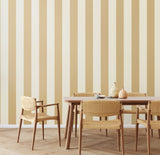 Simply Stripes Wide Stripe Sand wallpaper by Ohpopsi shown on a full wall