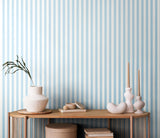 Simply Stripes Candy Stripe Baby Blue wallpaper by Ohpopsi shown on a full wall