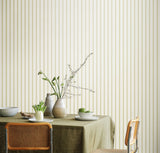 Simply Stripes Ticking Stripe Asparagus wallpaper by Ohpopsi shown on a full wall