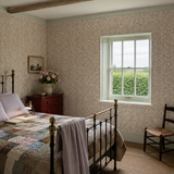 Grey floral wallpaper in a bedroom, Flora Ditsy Peach & Dove by OHPOPSI, with joinery painted in Secret Cinema