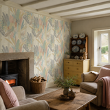 Peach botanical wallpaper in a sitting room, Glasshouse Blush & Apricot by OHPOPSI, with joinery painted in Antique Gold