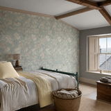 Teal floral wallpaper in a bedroom, Hummingbird - Rich Duckegg by OHPOPSI, with joinery painted in Green Envy