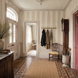 Neutral striped wallpaper in a hallway, Multi Stripe - Putty Mix by OHPOPSI, with joinery painted in Penally Pink