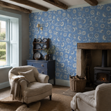 Blue floral wallpaper in a sitting room, Neva Blue by Olenka, with joinery painted in Hyacinth Bucket
