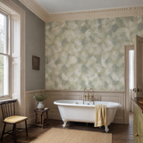 Green geometric wallpaper in a bathroom, Orb - Thyme by OHPOPSI, with joinery painted in Freaky Leaves