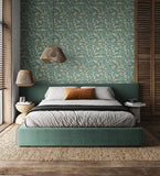 Riches of Nature Lorena Vine Petrol wallpaper by Ohpopsi shown on a full wall