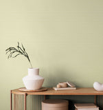 Purity Ditsy Diamond Pistachio wallpaper by Hoopla Walls shown on a full wall