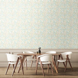 Eden Vol 1 Rosehip Trail Soft Mint wallpaper by Hoopla Walls in a styled dining room