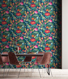 Riches of Nature Clementine Ink & Flamingo wallpaper by Ohpopsi shown on a full wall