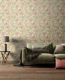 Eden Vol 1 Honeysuckle Leaf Trail Coral Pink wallpaper by Hoopla Walls in a styled living room