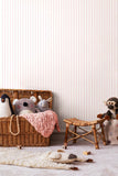 Purity Scallop Stripe Rose wallpaper by Hoopla Walls shown on a full wall