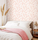 Purity Floral Toile Soft Coral wallpaper by Hoopla Walls shown on a full wall