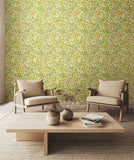 Eden Vol 1 Honeysuckle Leaf Trail Sunshine Yellow wallpaper by Hoopla Walls in a styled living room