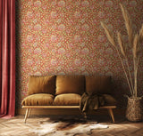 Eden Vol 1 Honeysuckle Leaf Trail Terracotta wallpaper by Hoopla Walls in a styled living room