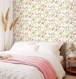 Purity Bird Song Coral Mix wallpaper by Hoopla Walls shown on a full wall