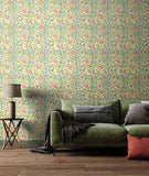 Eden Vol 1 Rosehip Trail Coral Pink wallpaper by Hoopla Walls in a styled living room