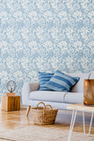 Eden Vol 1 Chrysanthemum Wedgewood Blue wallpaper by Hoopla Walls in a styled living room