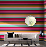 So Stripey Rainbow Bloc Hot Magenta wallpaper by Ohpopsi shown on a full wall