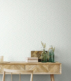 Purity Dotty Vine Seafoam wallpaper by Hoopla Walls shown on a full wall