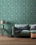 Eden Vol 1 Honeysuckle Leaf Trail Dark Jade wallpaper by Hoopla Walls in a styled living room
