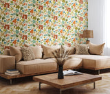 Riches of Nature Lush Leaves Marmalade wallpaper by Ohpopsi shown on a full wall