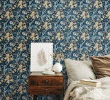 Eden Vol 1 Lily Ogee Navy Blue wallpaper by Hoopla Walls in a styled bedroom
