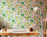 Riches of Nature Lush Leaves Watermelon wallpaper by Ohpopsi shown on a full wall