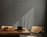 Riches of Nature Dotty Leaf Charcoal wallpaper by Ohpopsi shown on a full wall