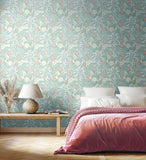 Eden Vol 1 Seaweed Garden Seafoam wallpaper by Hoopla Walls in a styled bedroom