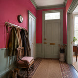 Hallway painted in Penally Pink deep pink eco paint