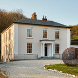House exterior painted in Penally Stone neutral beige eco paint