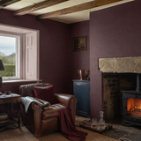Paintable textured wallpaper in a snug, Portland RD341, painted in About Damson