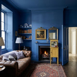 Living room painted in Royal Sapphire navy blue eco paint