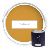 Two tins of The Colonel mustard yellow eco paint from Victory Colours