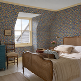 Blue floral wallpaper in a bedroom, Tiny Tulip Indigo Mix by OHPOPSI, with joinery painted in Queen's Fisher