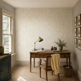 Neutral botanical wallpaper in an office, Verdure Linen by OHPOPSI, with joinery painted in Wine Bottle Green