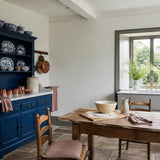 Kitchen painted in Victory White white eco paint, with the dresser in Blue Dragoon