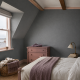 Paintable textured wallpaper in a bedroom, Silver Shadow RD464, painted in Cannonball