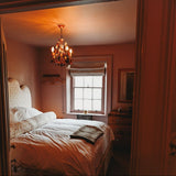 Room painted in Wonder House dusky pink eco paint
