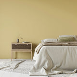 Bedroom painted in Wild Honey pale yellow eco paint