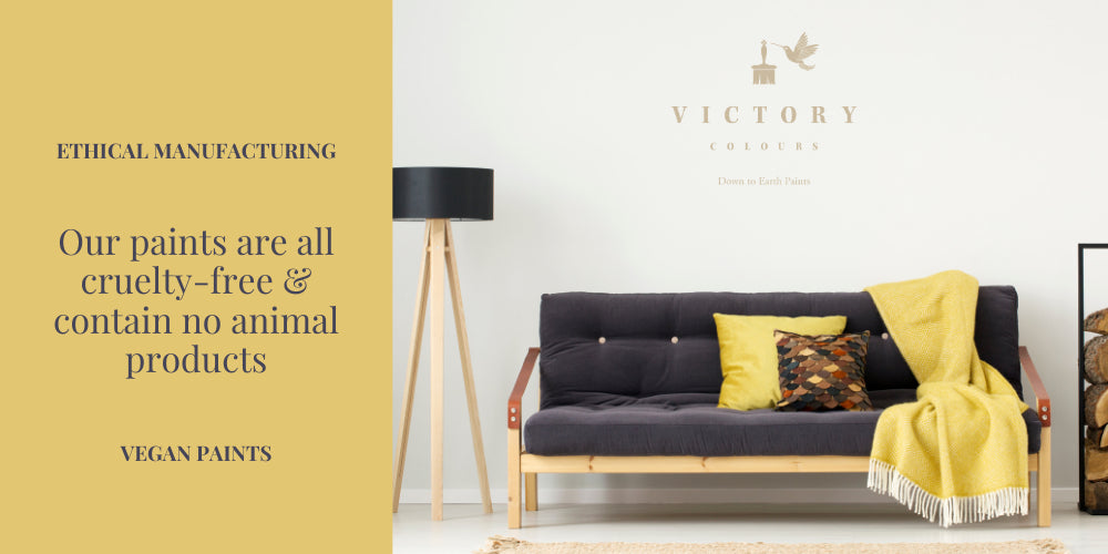 Victory Colours Cruelty Free & Vegan Paint Gossamer White with Yellow Throw over Grey Couch